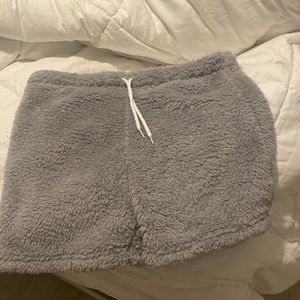 Brand new fuzzy fleece shorts with drawstring.